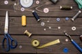 Set of various sewing supplies on wooden surface Royalty Free Stock Photo