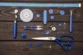 Set of various sewing supplies on wooden surface Royalty Free Stock Photo