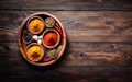 Set of various spices, cardamom, paprika, peppers, garlic, turmeric in bamboo bowls on a dark wooden background