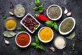 Set of Various spices and herbs on black stone table. Royalty Free Stock Photo