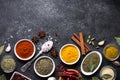 Set of Various spices and herbs on black stone table. Royalty Free Stock Photo