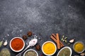 Set of Various spices and herbs on black stone table. Royalty Free Stock Photo