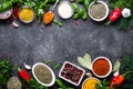 Set of Various spices and herbs on black stone table. Royalty Free Stock Photo