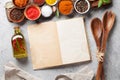 Set of various spices and herbs and cookbook Royalty Free Stock Photo