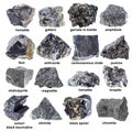 Various unpolished black stones with names cutout Royalty Free Stock Photo