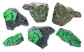 Set of various uvarovite garnet crystals on stones Royalty Free Stock Photo