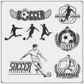 Set of vector football and soccer emblems, labels and design elements. Player silhouettes. Royalty Free Stock Photo