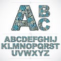 Set of vector ornate capitals, flower-patterned typescript. Blue