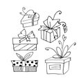 Set of Vector outline hand drawn images of gift boxes in Doodle style. Festive design element for Christmas, Valentines day, Royalty Free Stock Photo