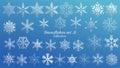 Set of vector Snowflakes Christmas design with blue ice luxury color on blue background. Winter white snow flake crystal element. Royalty Free Stock Photo