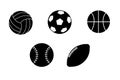 A set of vector sports ball icons. Black balls for football, volleyball, tennis, basketball, rugby. Ball icons isolated Royalty Free Stock Photo