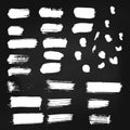 Set of vector white paint brush spots on chalkboard background. Big set of watercolor strokes isolated on black. Grunge Royalty Free Stock Photo