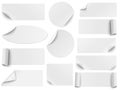 Set of vector white paper stickers of different shapes with curled corners isolated on white background. Round, oval, square,