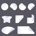 Set of vector white paper stickers of different shapes with curled corners isolated on background. Royalty Free Stock Photo