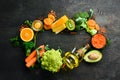 Set of vegetables, fruits and organic food on a dark background. Dietary healthy food. Top view. Free space for your text Royalty Free Stock Photo