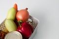 Set of vegetables for proper nutrition in a basket on the table
