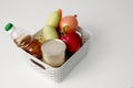 Set of vegetables for proper nutrition in a basket on the table