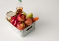 Set of vegetables for proper nutrition in a basket on the table