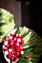 Set of vegetables for salad: lettuce, cucumbers, radish, green onions and green leafs of sorrel Royalty Free Stock Photo