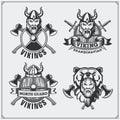 Set of viking labels, badges and emblems. Horned helmet, warrior, shield, sword and ax. Vintage style. Royalty Free Stock Photo