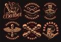 Set of vintage barbershop emblems on a dark background