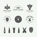 Set of vintage beer and pub logos, labels and emblems with bottles, hops, and wheat Royalty Free Stock Photo