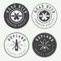 Set of vintage beer and pub logos, labels and emblems with bottles Royalty Free Stock Photo