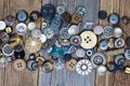Set of vintage buttons on aged table. close up Royalty Free Stock Photo