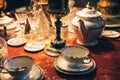 Set of vintage dinnerware on red table Royalty Free Stock Photo