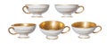Set of vintage granny`s, antique tea, coffee cups with gold rim Royalty Free Stock Photo