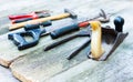 Set of vintage hand construction and carpentry tools hammers on a old wooden background, retro concept Royalty Free Stock Photo