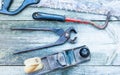 Set of vintage hand construction and carpentry tools hammers on a old wooden background, retro concept Royalty Free Stock Photo