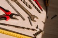 Set of vintage hand construction and carpentry tools hammers on a old wooden background