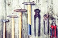 Set of vintage hand construction tools hammers on a wooden background, retro concept Royalty Free Stock Photo