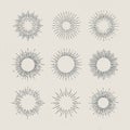 Set of vintage hand drawn sunbursts on dark background. Royalty Free Stock Photo