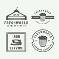 Set of vintage laundry, cleaning or iron service logos, emblems, badges and design elements. Monochrome Graphic Art. Vector Illus