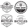 Set of vintage and modern bike shop logo badges and labels. Cycle wheel isolated vector Royalty Free Stock Photo