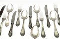 Set of vintage silver spoons and forks isolated on white background Royalty Free Stock Photo