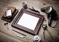 Set of vintage tools of barber shop and black picture frame Royalty Free Stock Photo