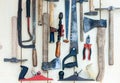 Set of vintage well used hand construction tools for handyman, hammers, on a wooden background