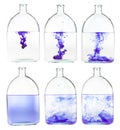 Set of violet ink solutions in water isolated Royalty Free Stock Photo