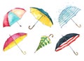 Set of watercolor hand painted colorful umbrellas