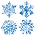 Set of watercolor snowflakes. Frost crystals drawn on paper by hand. New Year and Christmas card. Cute winter print