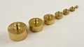 Set of weights made from brass Royalty Free Stock Photo