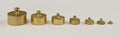 Set of weights made from brass Royalty Free Stock Photo