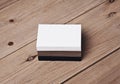 Set of white, black and craft business cards on wood table. Royalty Free Stock Photo