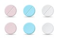 Set of white, blue and pink round medicine pills of various kind