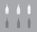 A set of white bottles of different shapes on black background