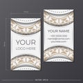 A set of white business cards with beige ornaments. Print-ready business card design with space for your text and Royalty Free Stock Photo