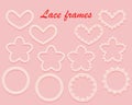 Set of white carved frames of various shapes. Ring, heart and flower of lace. Ornate vintage elements isolated on a pink